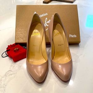 Cream colored, 4” Christian Louboutin heels with 2 sets of stud bottoms. Size 38